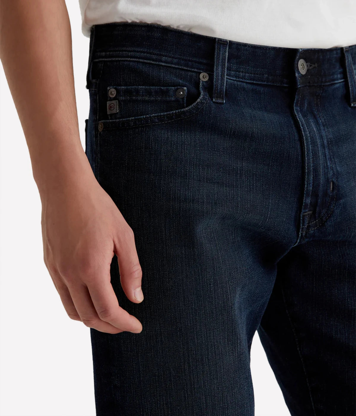 AG The Graduate Jeans, slim mid-rise men's denim with a relaxed thigh and tapered leg, crafted from high-stretch Japanese denim for comfort and style. Made in USA.