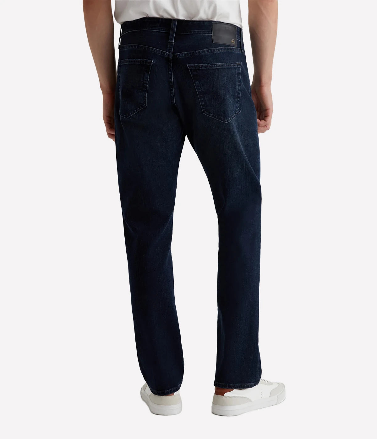 AG The Graduate Jeans, slim mid-rise men's denim with a relaxed thigh and tapered leg, crafted from high-stretch Japanese denim for comfort and style. Made in USA.