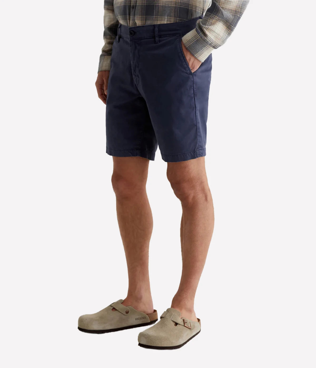 AG Wanderer Slim Fit Shorts in Sulfur Pacific Midnight (navy), featuring a sharp trouser look with a tapered leg opening. Made from ultra-lightweight cotton blend fabric for comfort. Material: 97.5% Cotton, 2.5% Elastane. Made in USA.