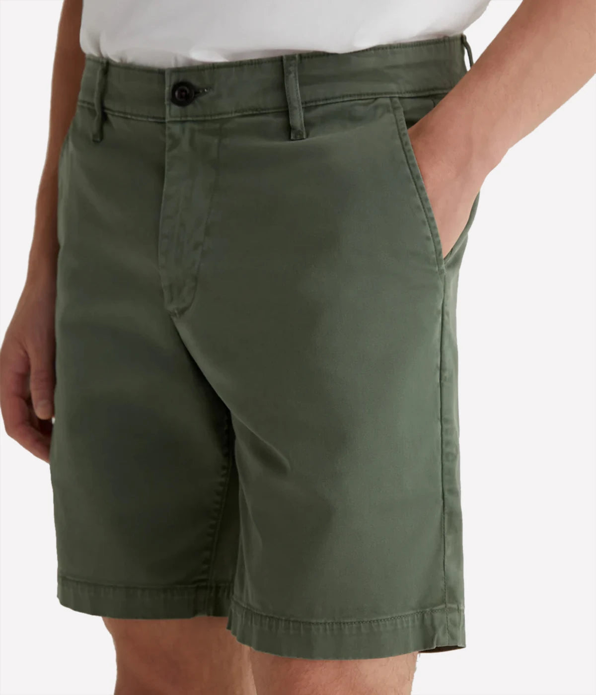 AG Wanderer Slim Fit Shorts in Sulfur Seaside Sage, featuring a sharp trouser look with a tapered leg opening. Made from ultra-lightweight cotton blend fabric for comfort. Material: 97.5% Cotton, 2.5% Elastane. Made in USA.