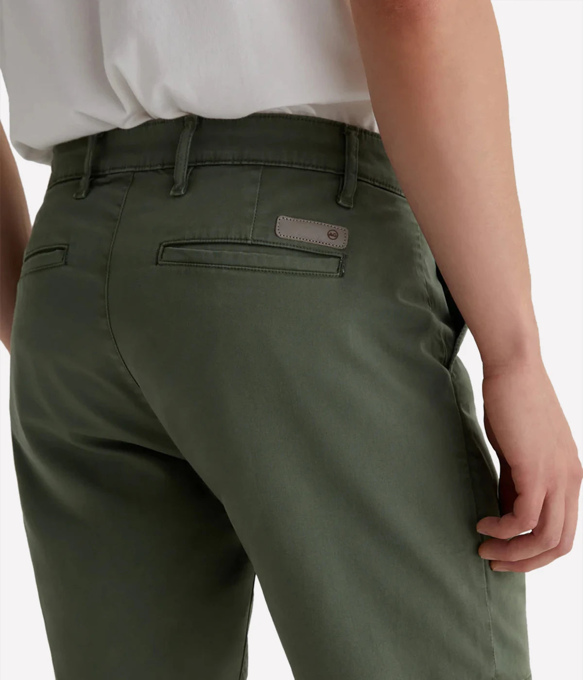 AG Wanderer Slim Fit Shorts in Sulfur Seaside Sage, featuring a sharp trouser look with a tapered leg opening. Made from ultra-lightweight cotton blend fabric for comfort. Material: 97.5% Cotton, 2.5% Elastane. Made in USA.