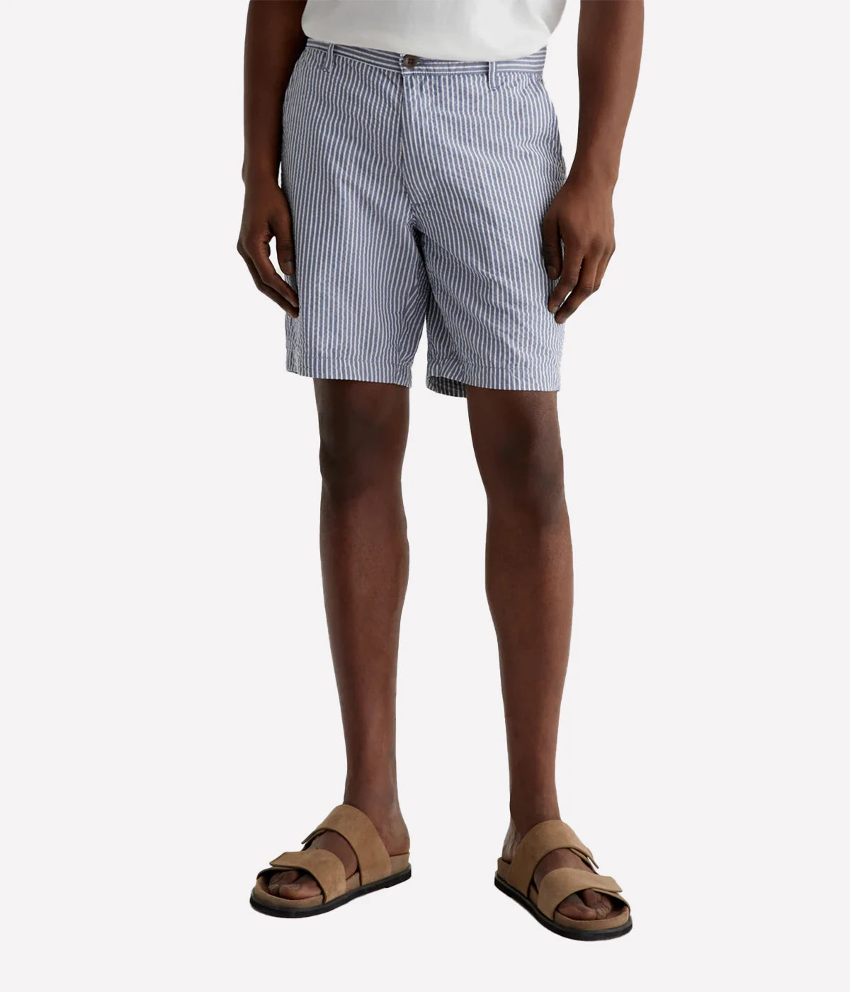 AG Wanderer Slim Fit Shorts in striped seersucker fabric, featuring a sharp trouser look with a tapered leg opening. Material: 100% Cotton. Made in USA.