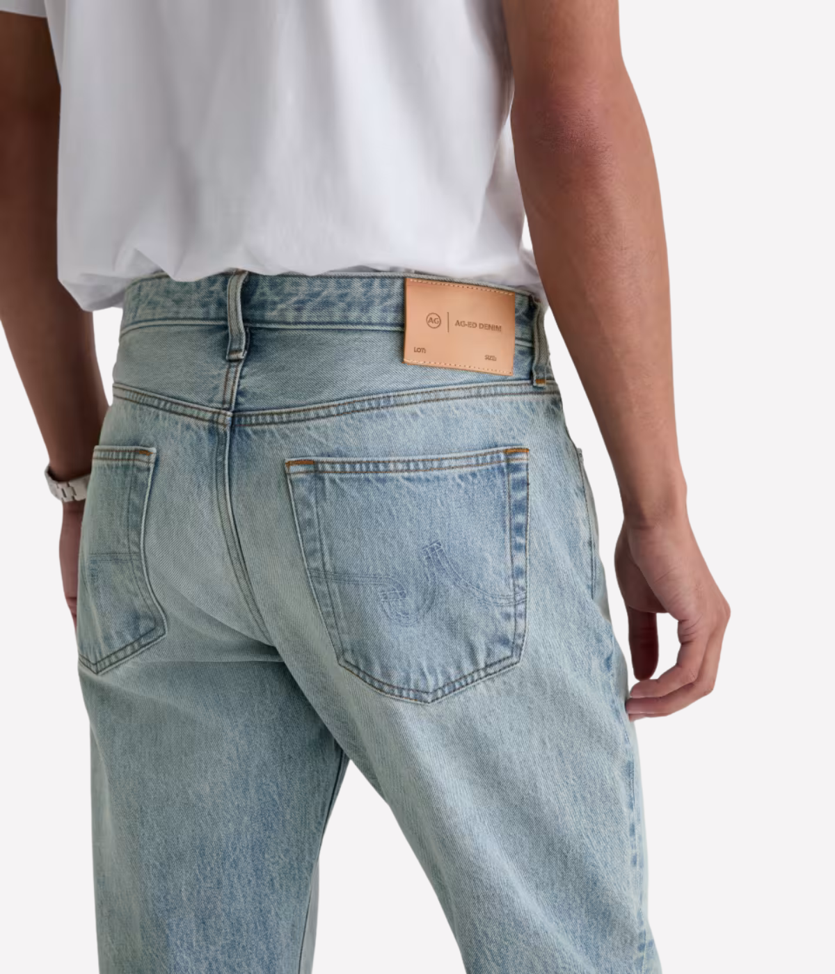 AG Everett Jean in 7 Years Sulfur Ashline worn on model - close up on back pocket.