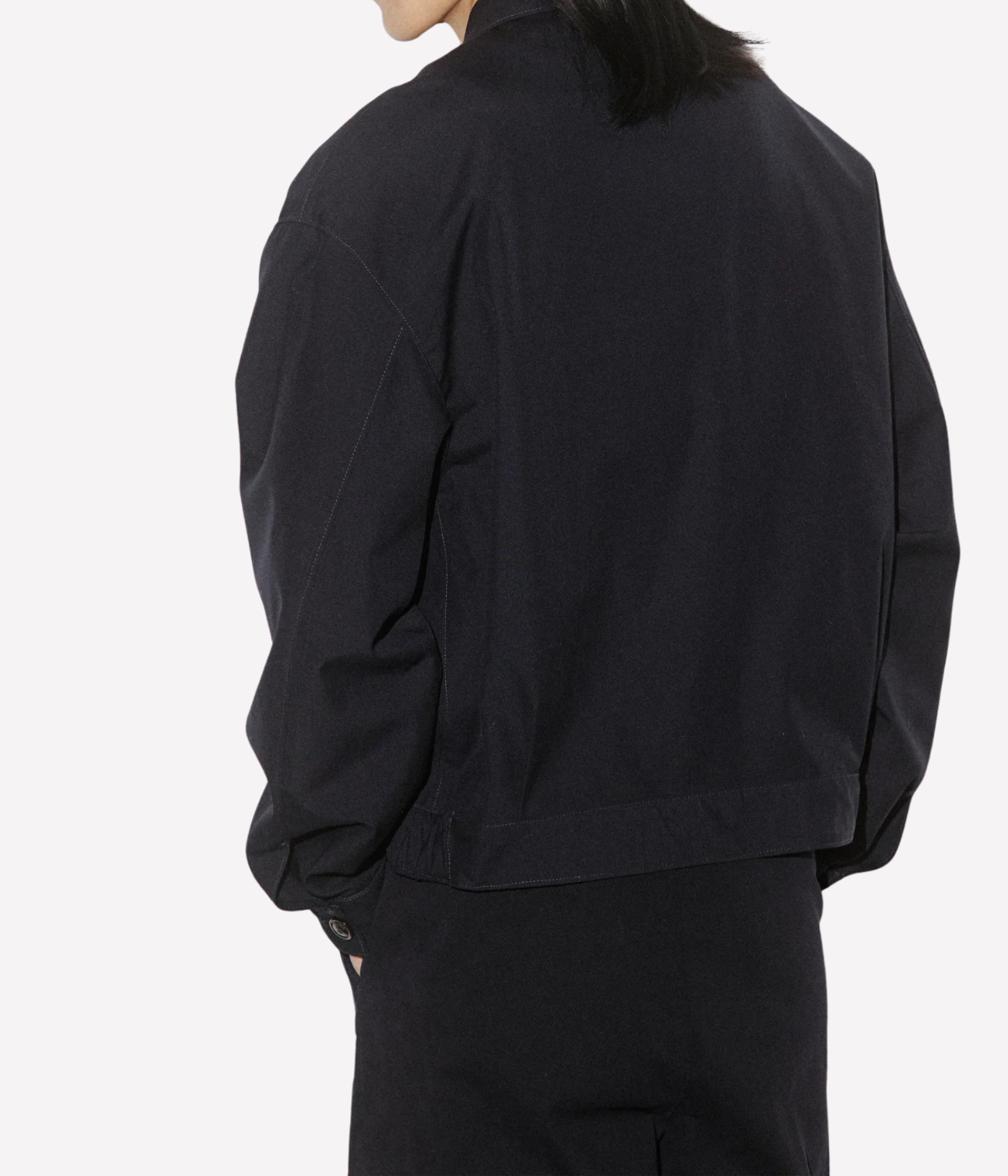 Valstar Stan Bomber Jacket in Navy - Angled Back View on Model