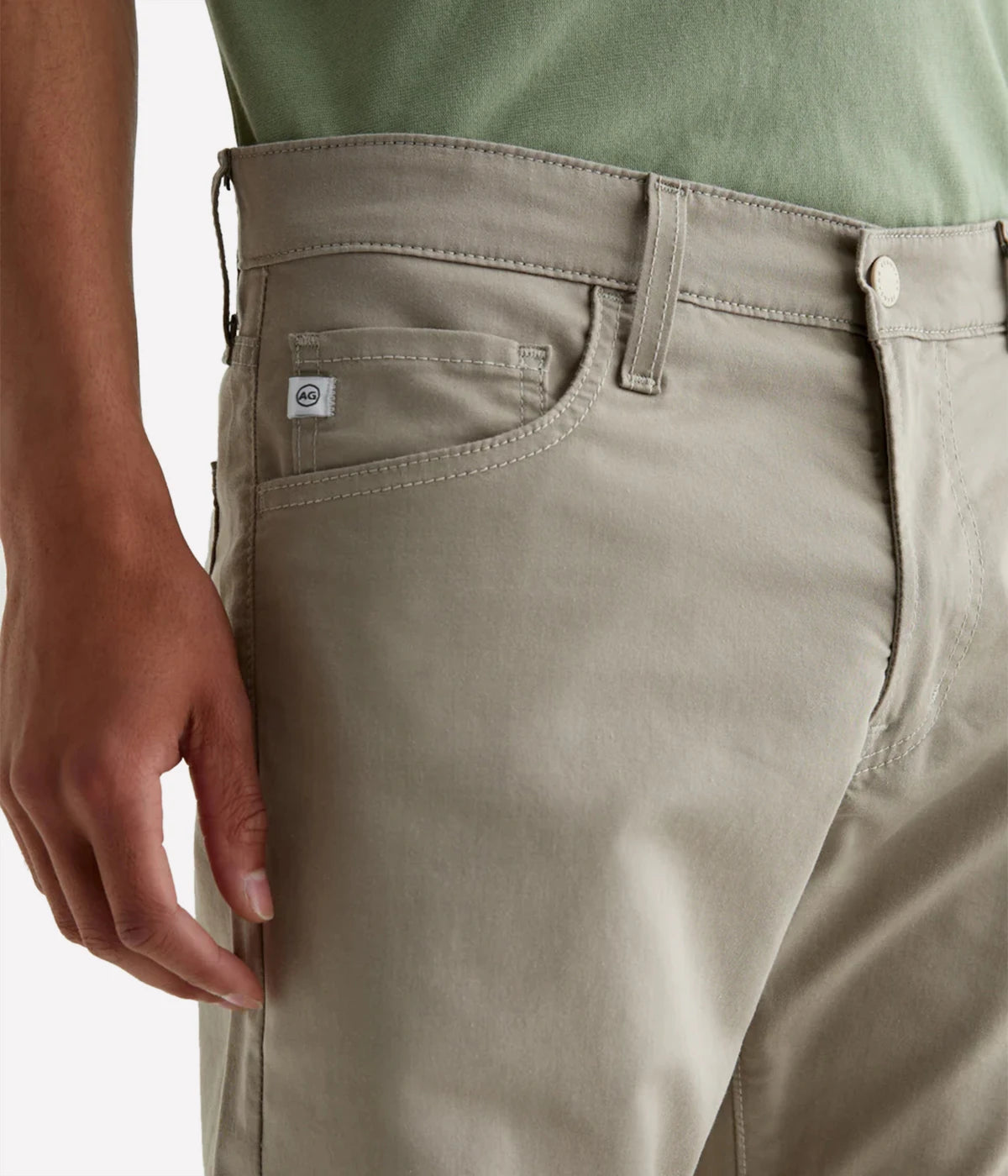 Tellis Modern Slim Fit Jeans in Airluxe fabric, featuring a tapered leg and ultra-soft, high-stretch material for all-day comfort. Classic five-pocket styling. Material: 53% Cotton, 44% Polyester, 3% Elastane. Made in USA.