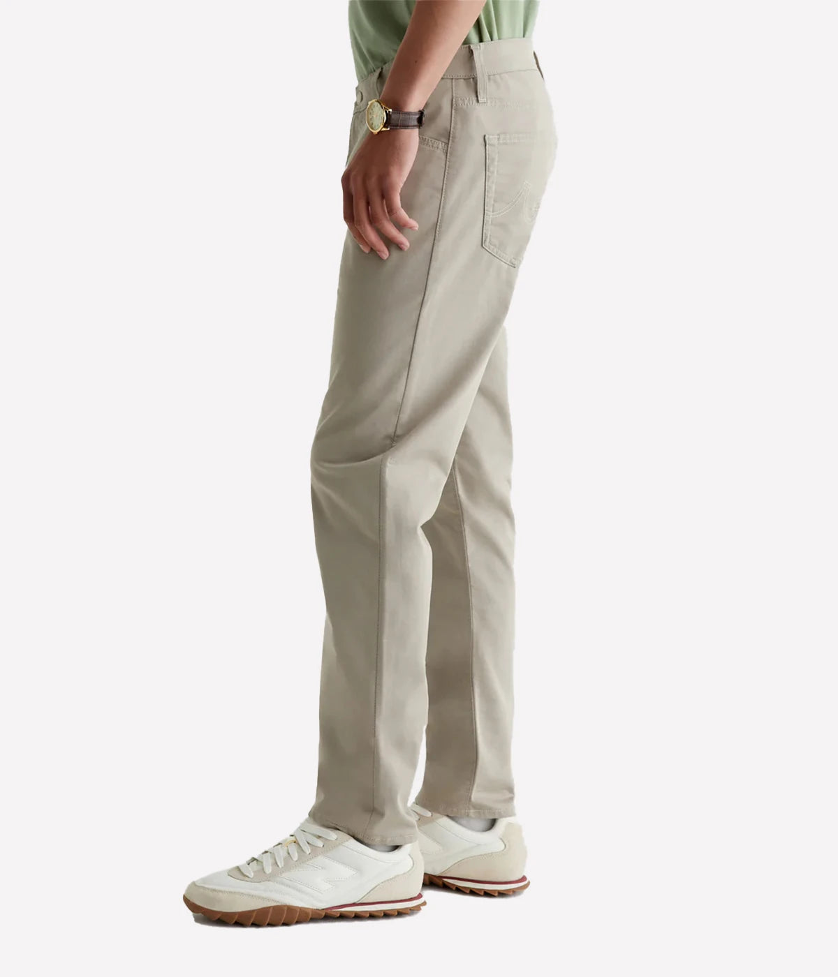 Tellis Modern Slim Fit Jeans in Airluxe fabric, featuring a tapered leg and ultra-soft, high-stretch material for all-day comfort. Classic five-pocket styling. Material: 53% Cotton, 44% Polyester, 3% Elastane. Made in USA.