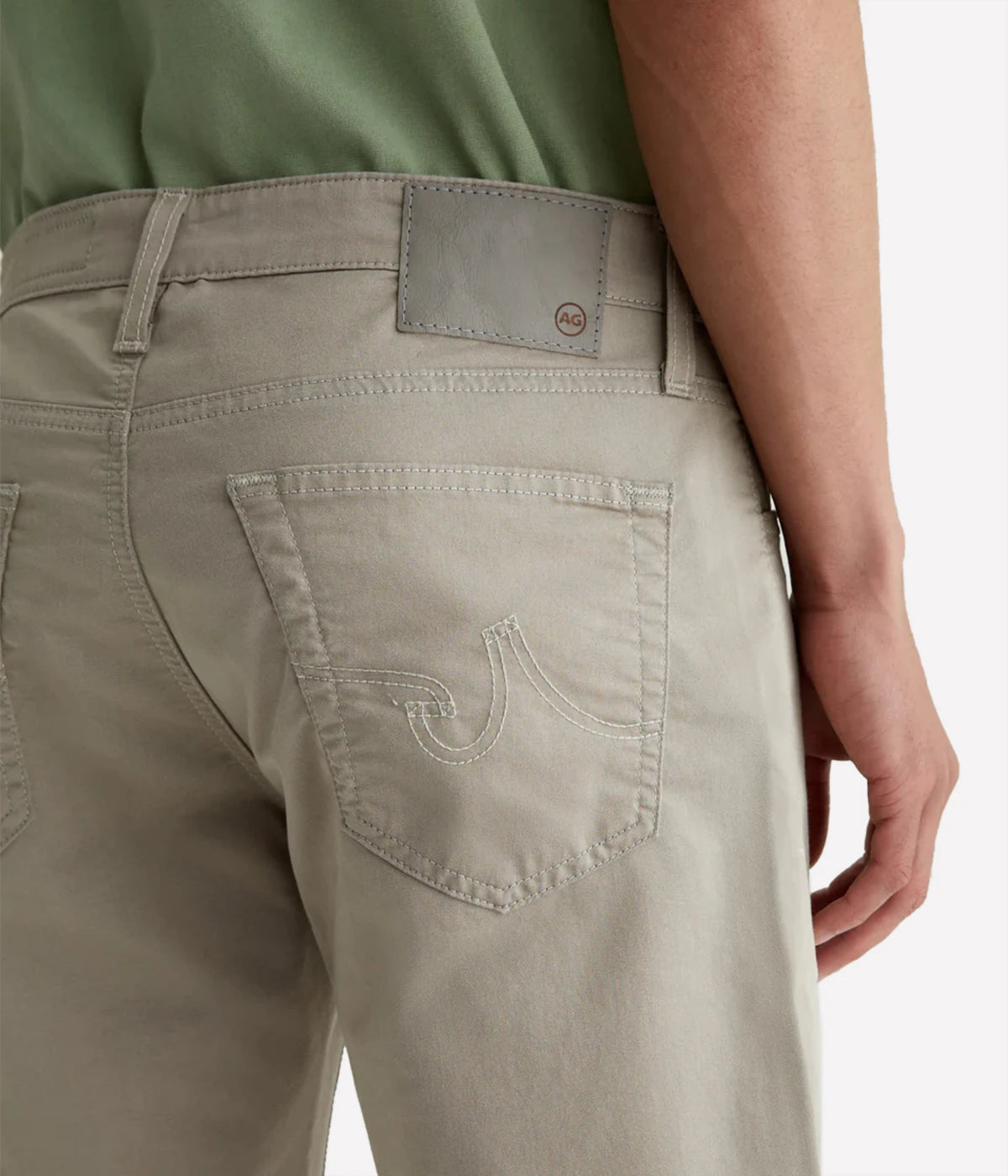 Tellis Modern Slim Fit Jeans in Airluxe fabric, featuring a tapered leg and ultra-soft, high-stretch material for all-day comfort. Classic five-pocket styling. Material: 53% Cotton, 44% Polyester, 3% Elastane. Made in USA.