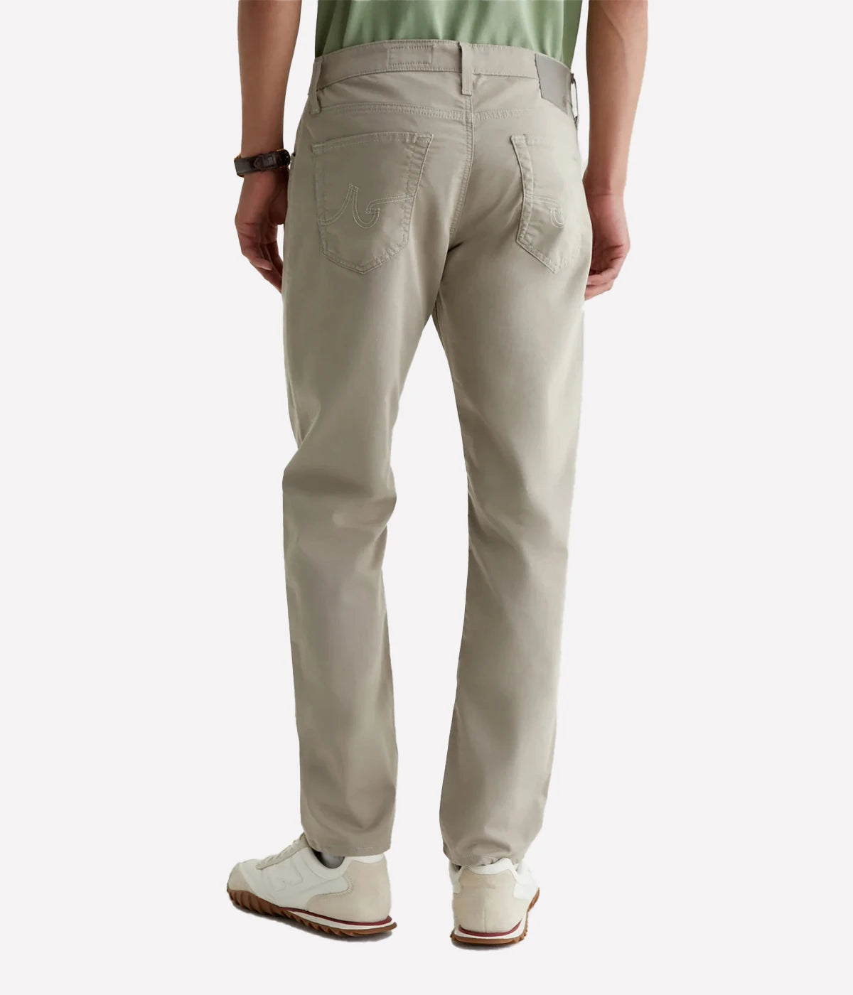 Tellis Modern Slim Fit Jeans in Airluxe fabric, featuring a tapered leg and ultra-soft, high-stretch material for all-day comfort. Classic five-pocket styling. Material: 53% Cotton, 44% Polyester, 3% Elastane. Made in USA.