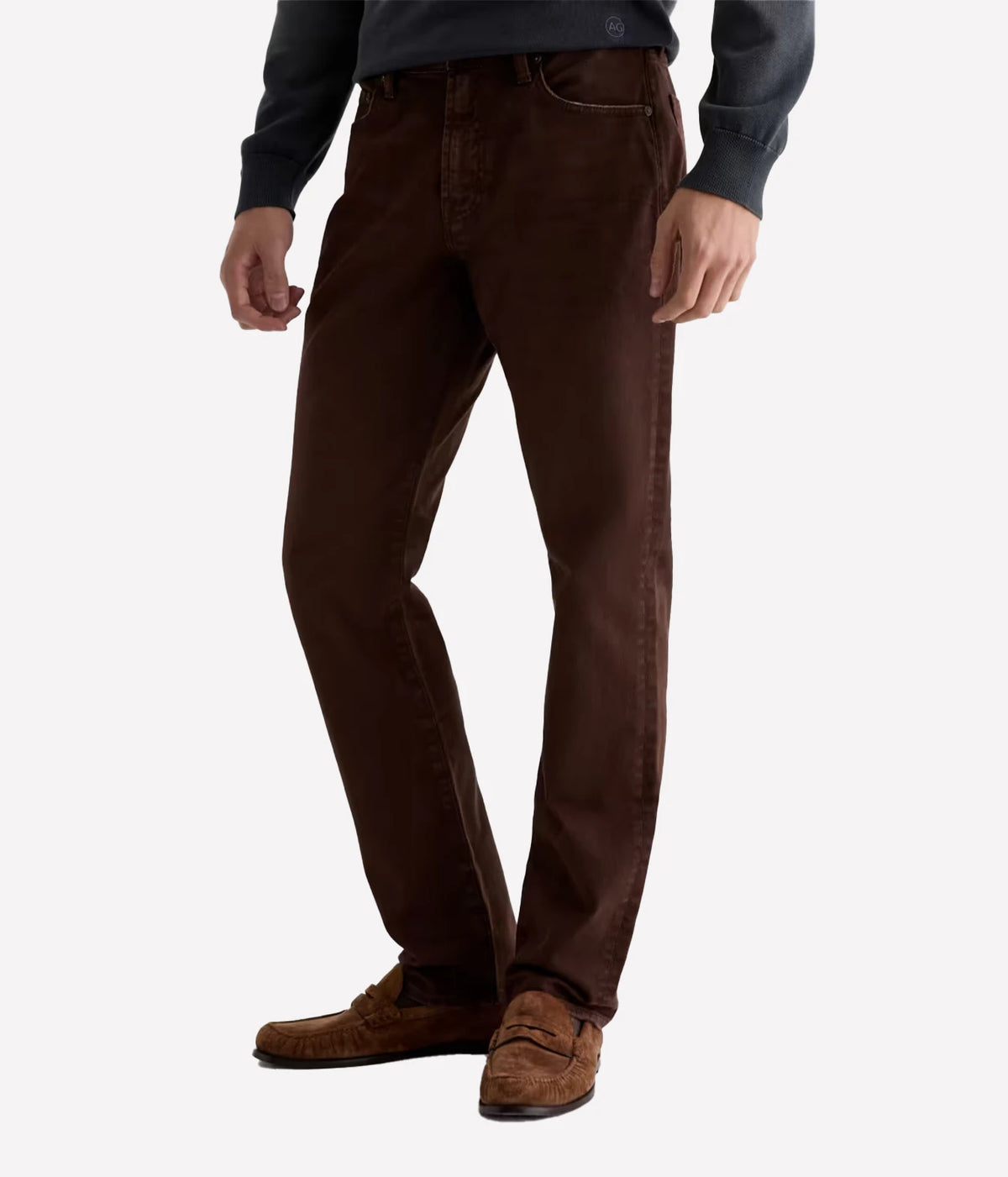 Man wearing AG Everett Jean in 7 Years Sulfur Wood Brown with a grey knit, three-quarter side view