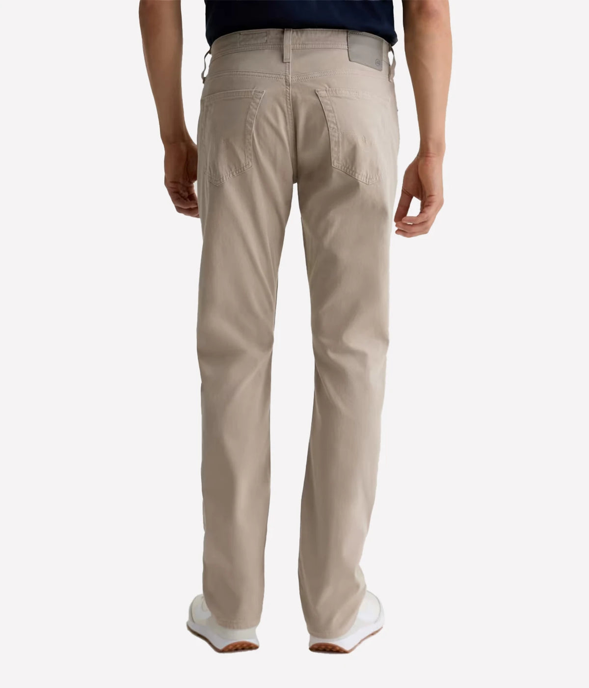 Man wearing AG Everett SUD Pant in Desert Stone, back view