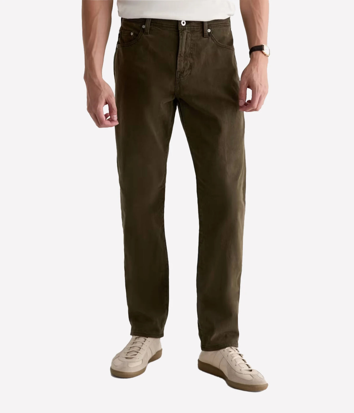 Man wearing AG Everett SUD Pant in Sulfur Dirty Olive with a white tee and cream sneakers, front view