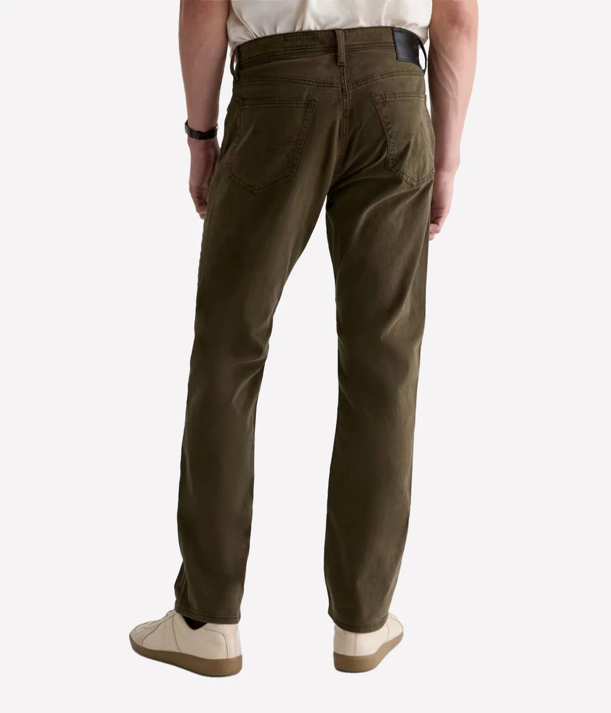 Man wearing AG Everett SUD Pant in Sulfur Dirty Olive, back view