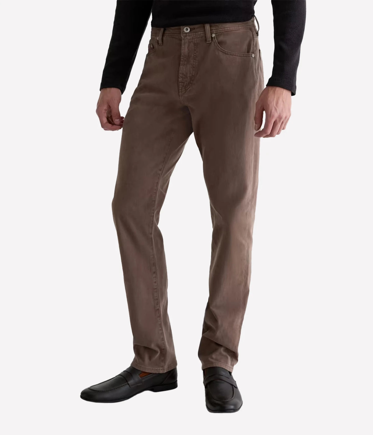 Man wearing AG Everett SUD Pant in Sulfur Taupe Grey with a black long-sleeve top, three-quarter front view