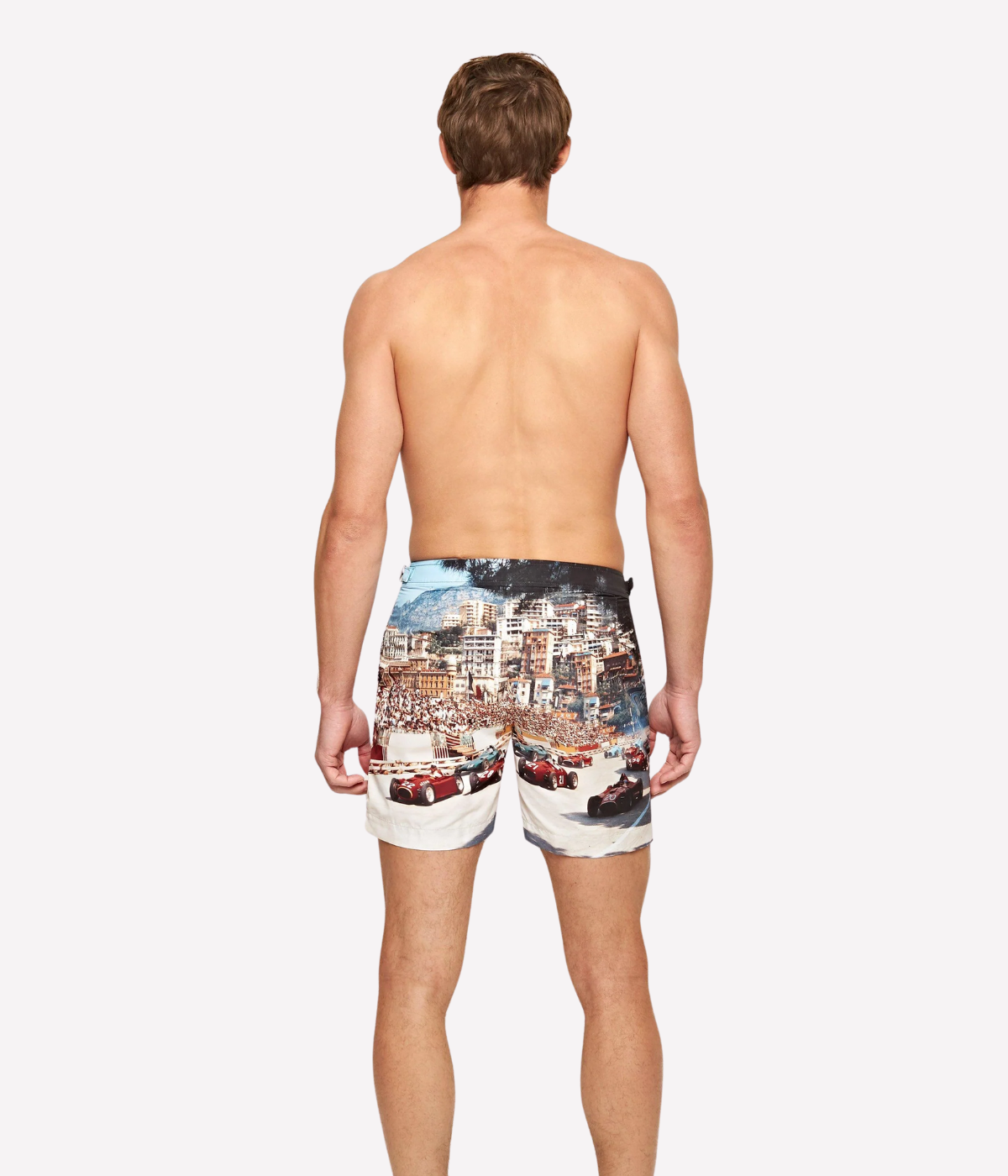 Orlebar Brown Classic Mid-Length Swim Shorts featuring a Formula 1 print of race cars at the start of the 1956 Grand Prix de Monaco, capturing the excitement of the iconic race.