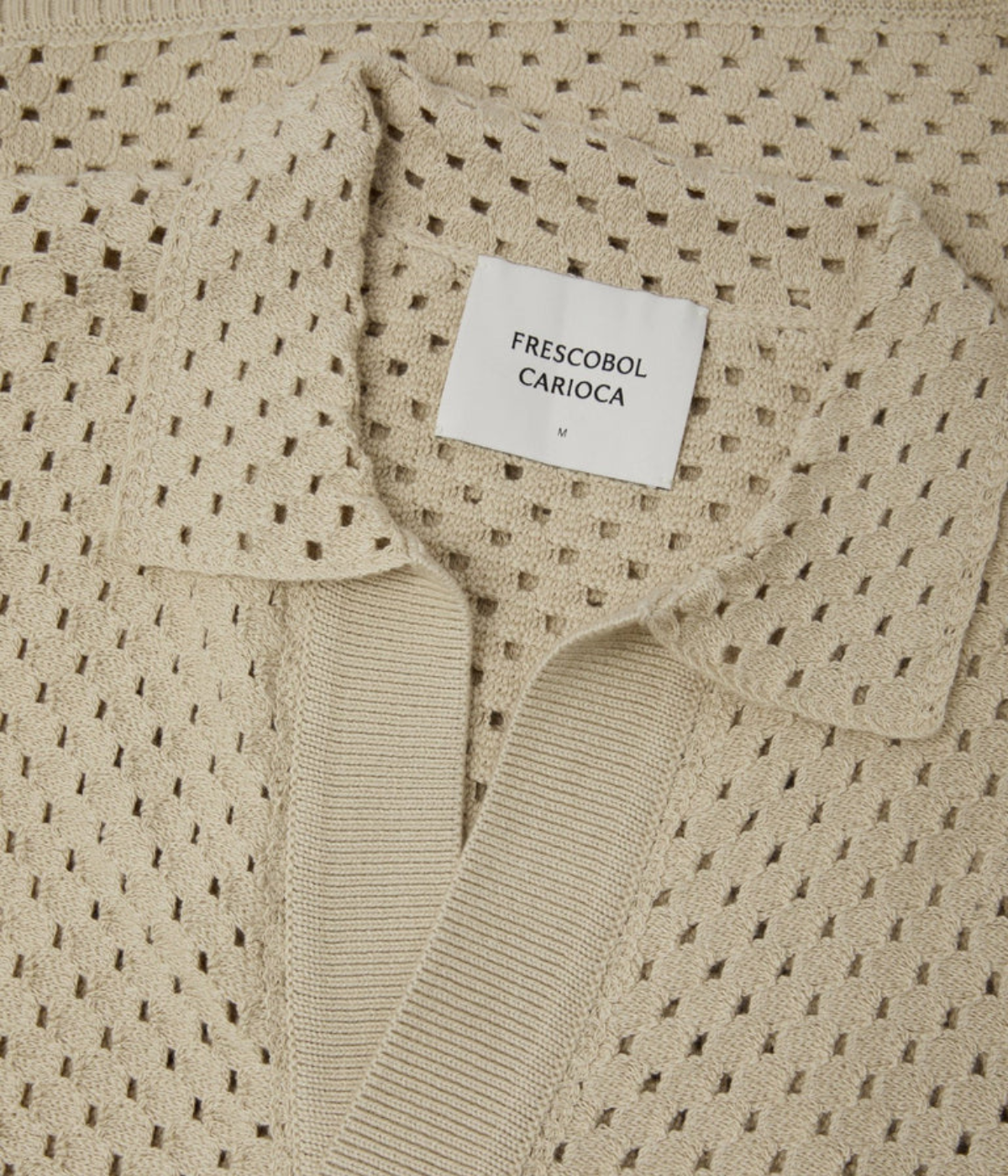 Frescobol Carioca Pinto Cotton Crochet Cardigan in Sand featuring an open crochet knit, open collar and button-front fastening - Closeup Shot on Collar