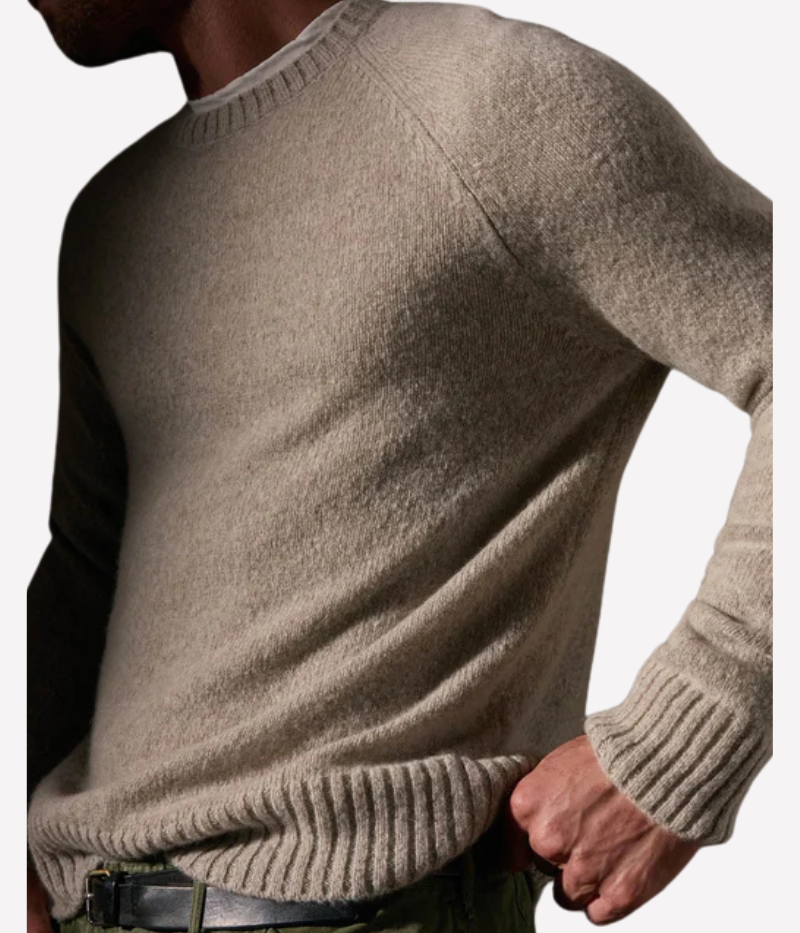 A soft, lightweight cashmere crewneck sweater in hazel brown, featuring ribbed detailing at the neckline, cuffs, and hem for a timeless and polished design.
