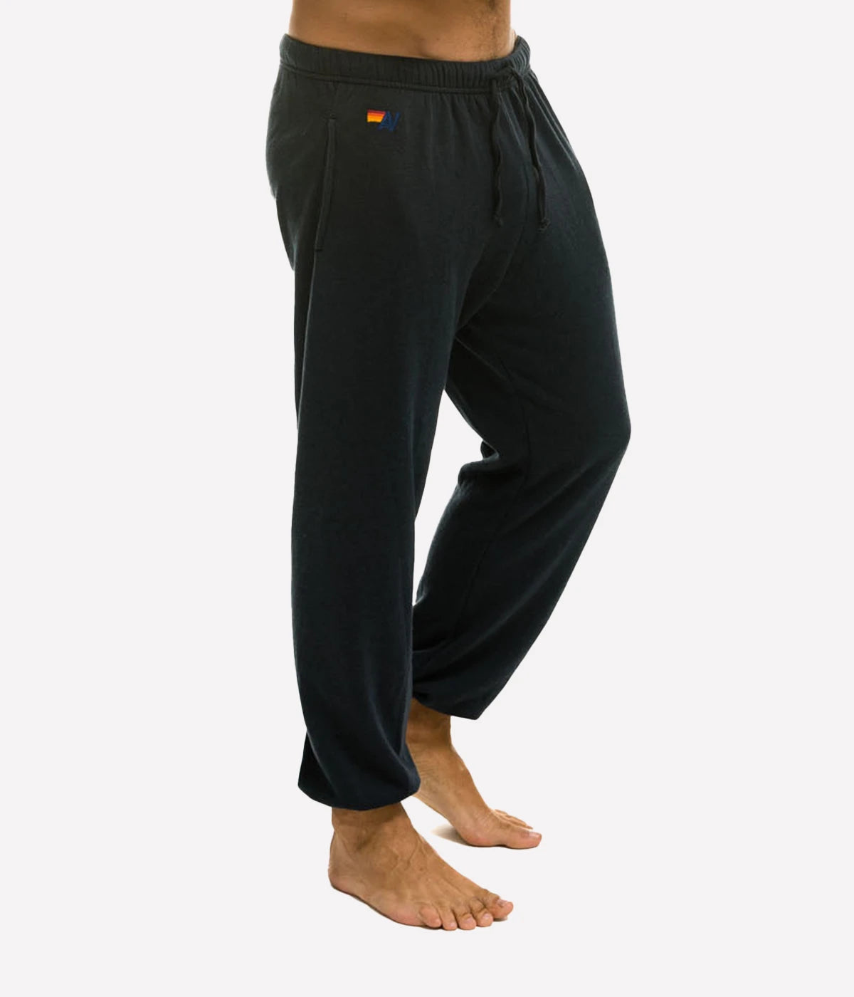 Aviator Nation 5 Stripe Sweatpants with single-needle stitch work down the leg, made from a polyester-cotton-rayon blend, made in Los Angeles.