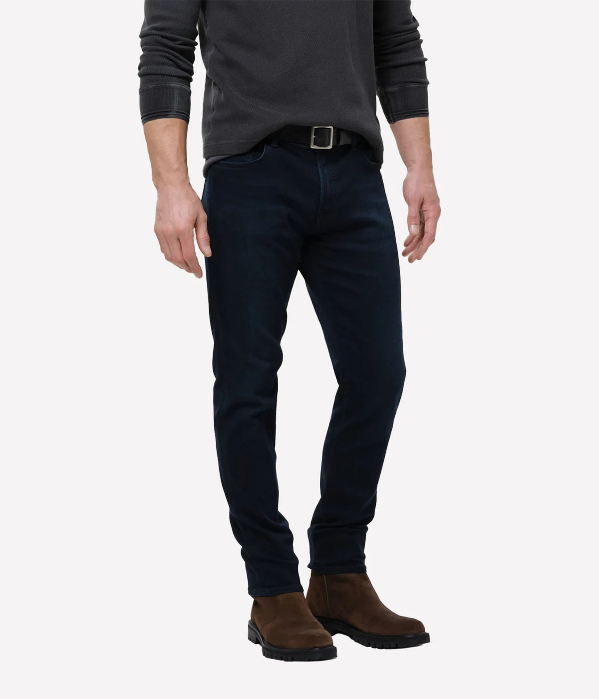 Man wearing Citizens of Humanity London Tapered Slim Perform Jean in Hyde, front leg view.