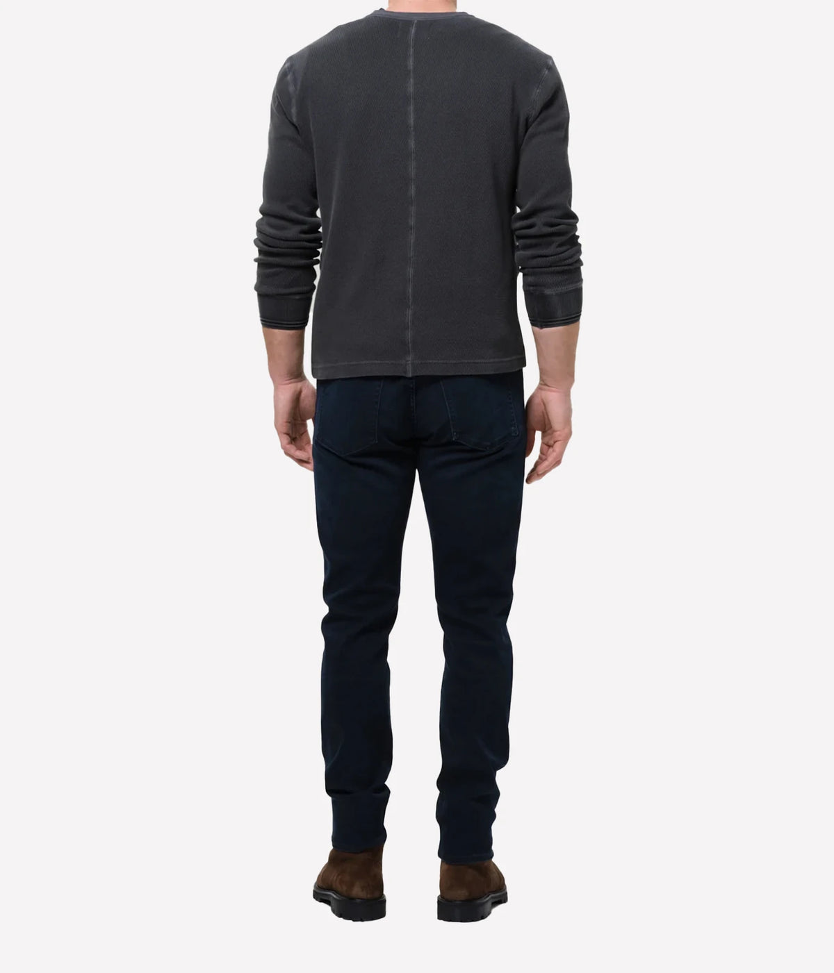 Man wearing Citizens of Humanity London Tapered Slim Perform Jean in Hyde, back view.