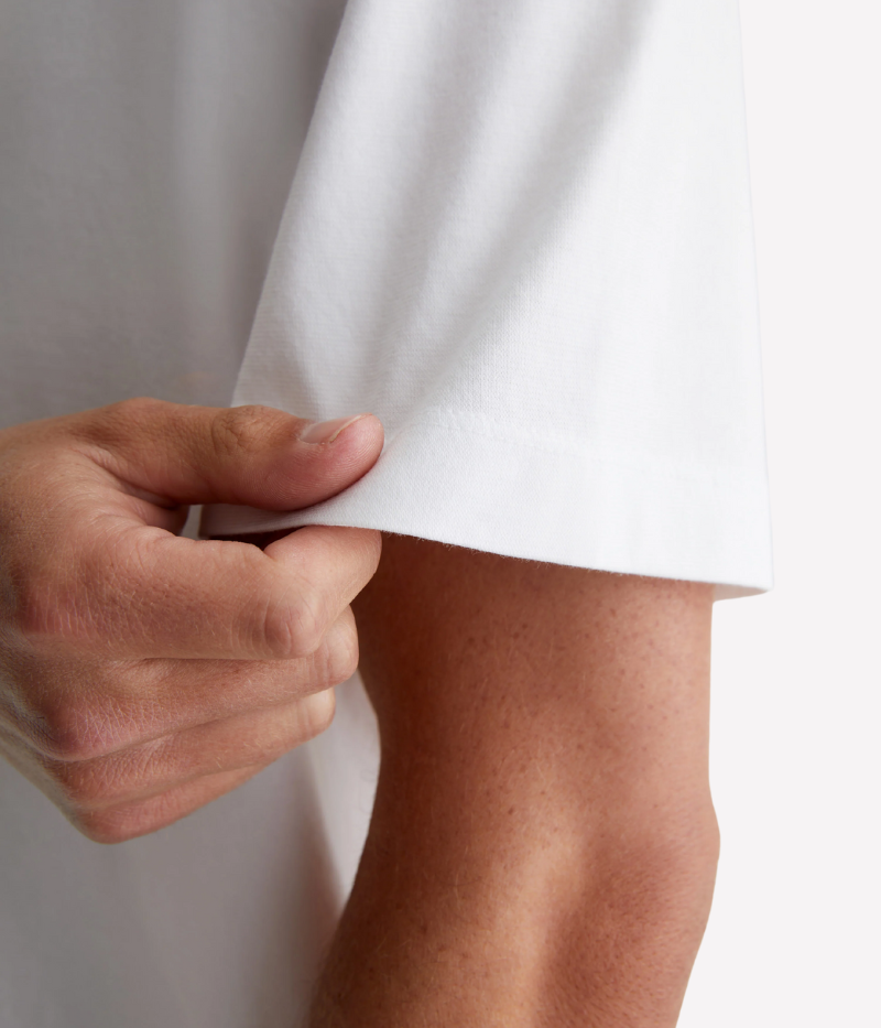 White relaxed-fit crewneck T-shirt with drop shoulders and premium cotton jersey.