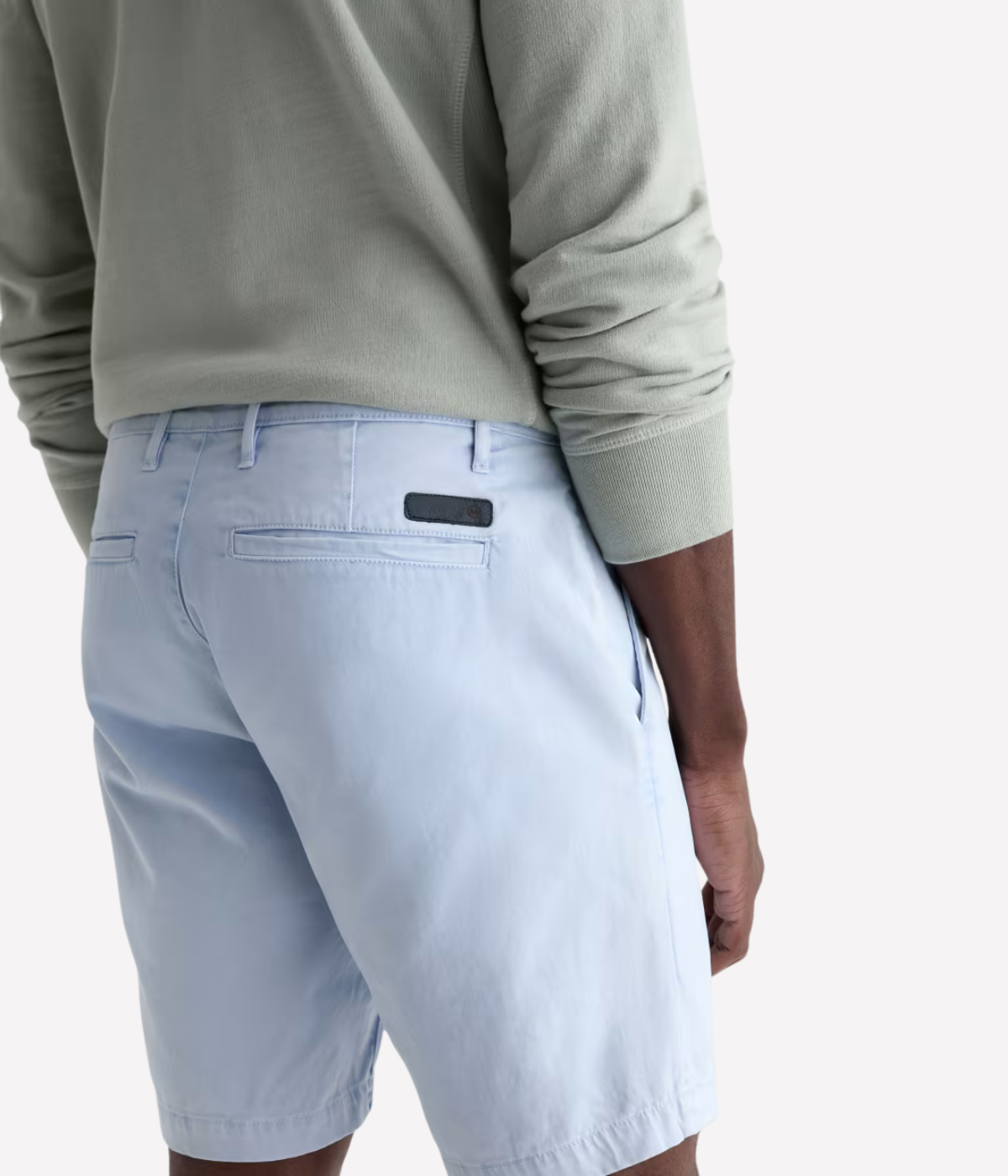AG Wanderer Short in Sulfur Fresh Blue worn on model - back view.