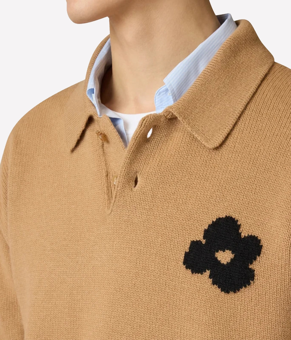 Close-up of Lardini Wool Cashmere Knit Polo in Beige on model showing the polo collar and black jacquard flower