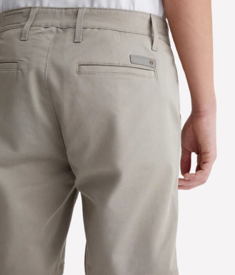 Back view of AG Wanderer Shorts in Dry Dust, showing the tailored fit and practical back pockets.