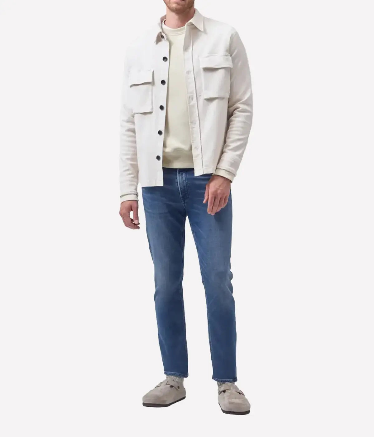 Adler Jean, featuring a low-rise waist and tapered legs. Inspired by the city's rock scene, this streamlined jean is free of embellishments for a minimalist, unfussy design. Crafted from a blend of lyocell, organic cotton, modal, polyester, and elastane for a comfortable fit.
