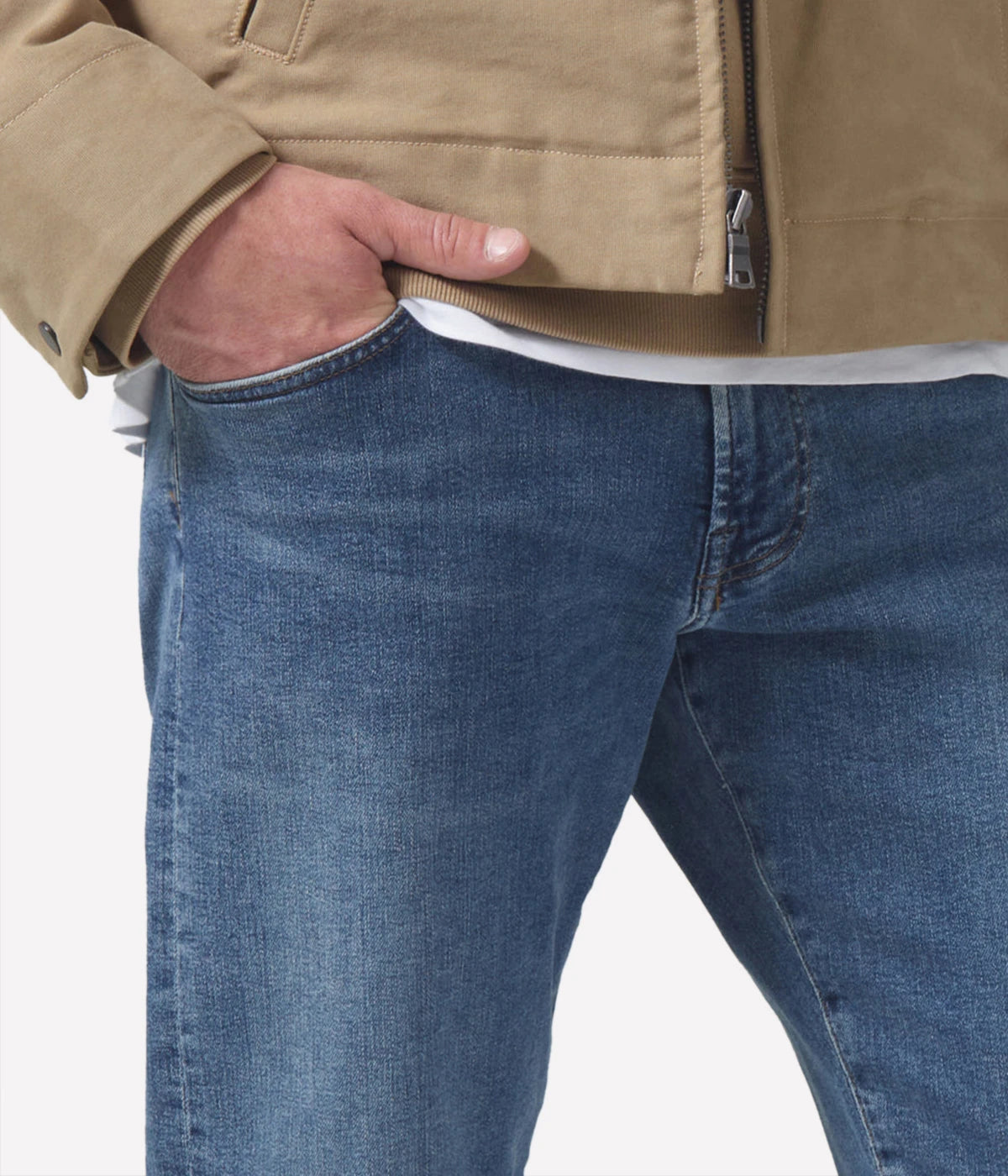 Adler Jean, designed with a low-rise waist and tapered legs. Inspired by the city's rock scene, this streamlined pair features a minimalist design, free of unnecessary embellishments. Crafted from a blend of lyocell, organic cotton, modal, polyester, and elastane for a comfortable, flexible fit.