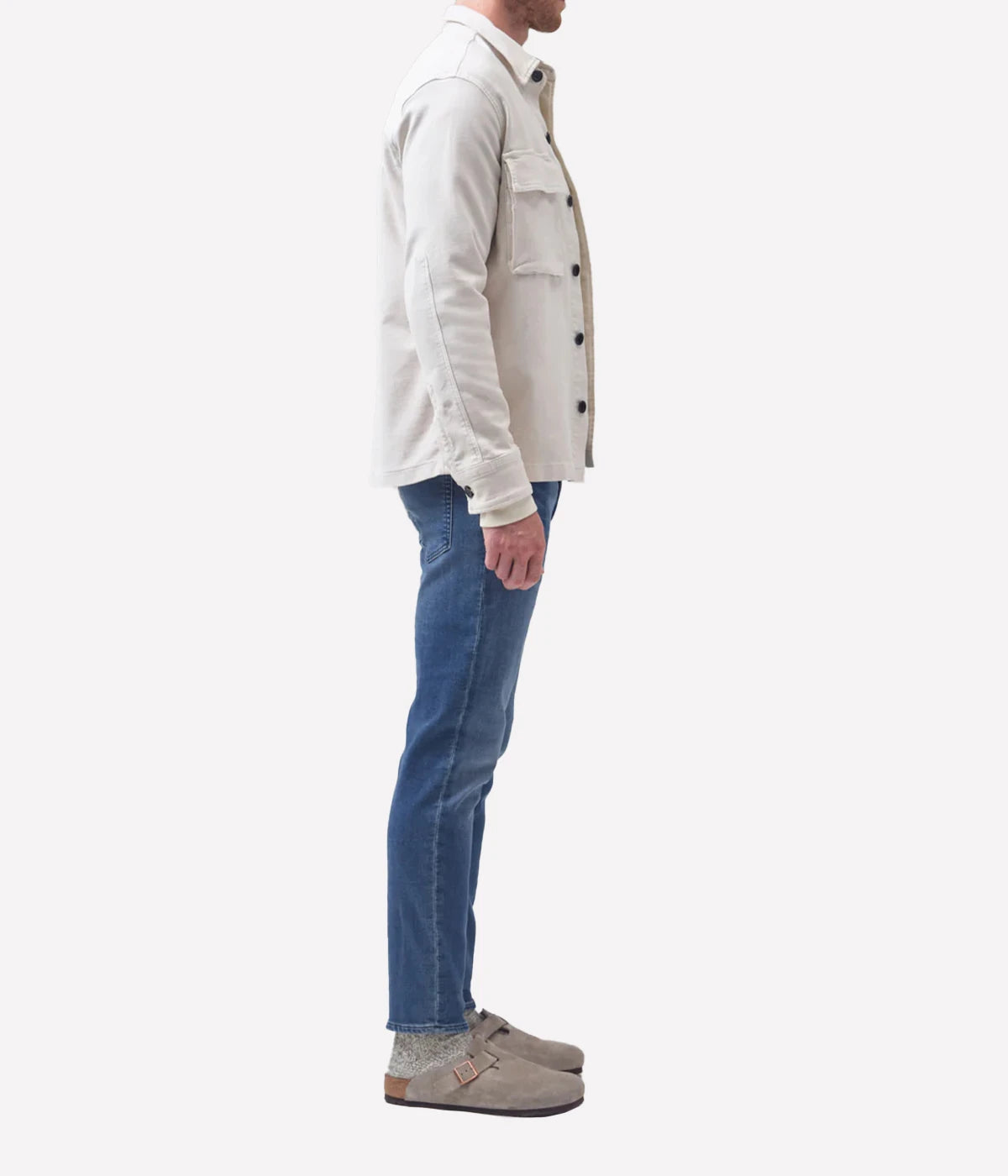Adler Jean, featuring a low-rise waist and tapered legs. Inspired by the city's rock scene, this streamlined jean is free of embellishments for a minimalist, unfussy design. Crafted from a blend of lyocell, organic cotton, modal, polyester, and elastane for a comfortable fit.