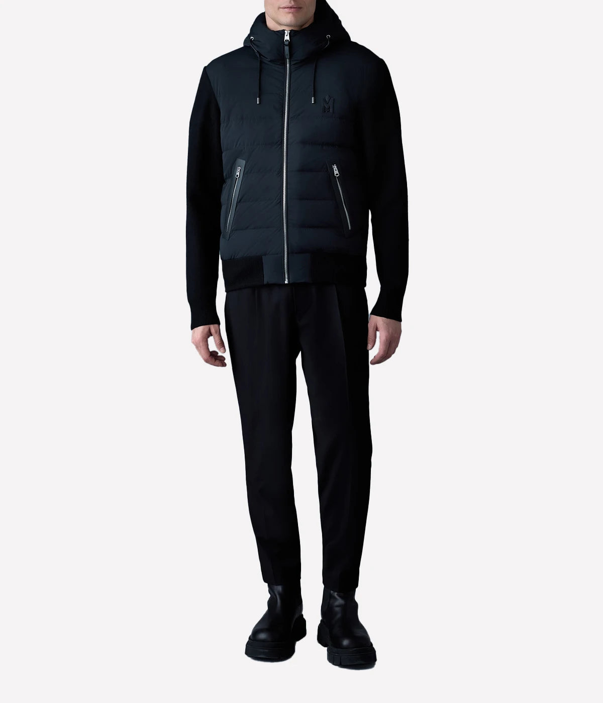 Hybrid down jacket with quilted front, knit sleeves and back, hooded design, zip pockets, and ribbed trims for a sleek, modern look.