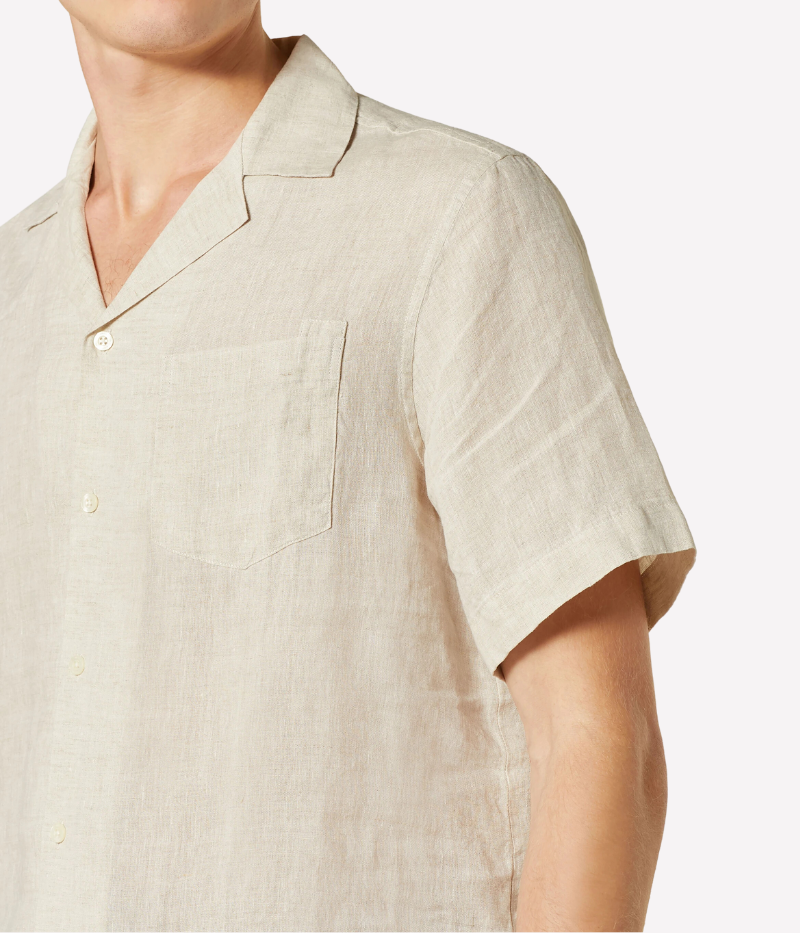 Close-up of the Frescobol Carioca Angelo Short Sleeve Shirt showing the textured Italian linen fabric, detailed stitching, and classic camp collar.