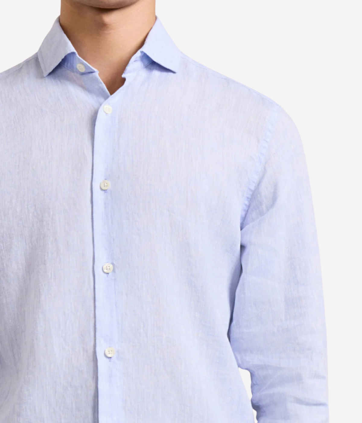 the Antonio Long Sleeve Linen Shirt by Frescobol Carioca, floating to emphasize its structured dress collar with stiffeners, imitation mother of pearl buttons, and full placket. The lightweight Italian linen construction ensures breathable comfort and elevated style for versatile occasion dressing.