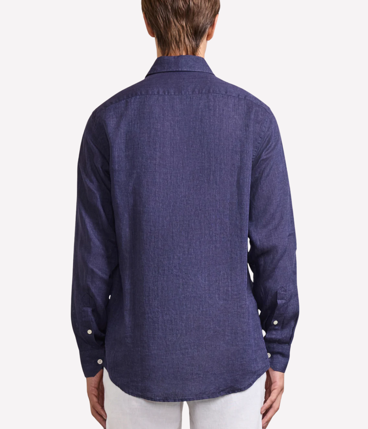 The Antonio Long Sleeve Linen Shirt by Frescobol Carioca, floating to emphasize its structured dress collar with stiffeners, imitation mother of pearl buttons, and full placket. The lightweight Italian linen construction ensures breathable comfort and elevated style for versatile occasion dressing.