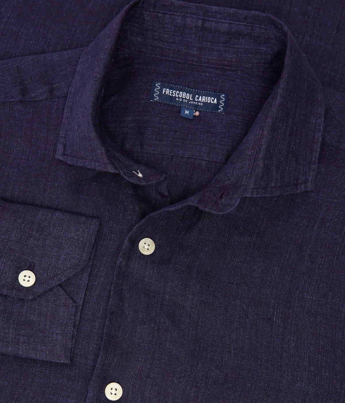 The Antonio Long Sleeve Linen Shirt by Frescobol Carioca, floating to emphasize its structured dress collar with stiffeners, imitation mother of pearl buttons, and full placket. The lightweight Italian linen construction ensures breathable comfort and elevated style for versatile occasion dressing.