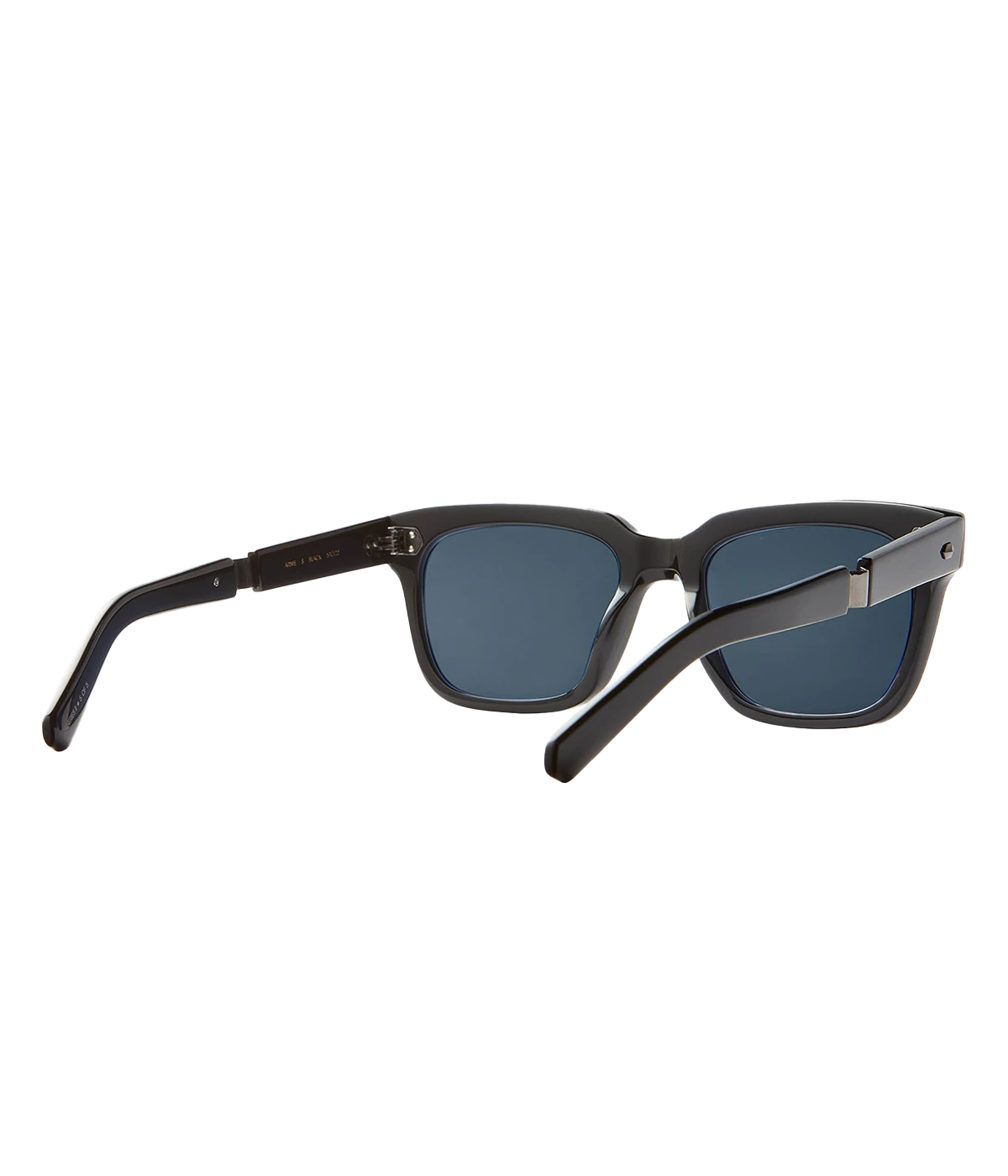 A modern take on a country club classic, the Arnie sunglasses by Mr Light feature a sleek acetate frame with titanium components and intricate filigree at the temples. Handcrafted in Japan with optical-quality CR39 lenses for superior clarity and UV protection.