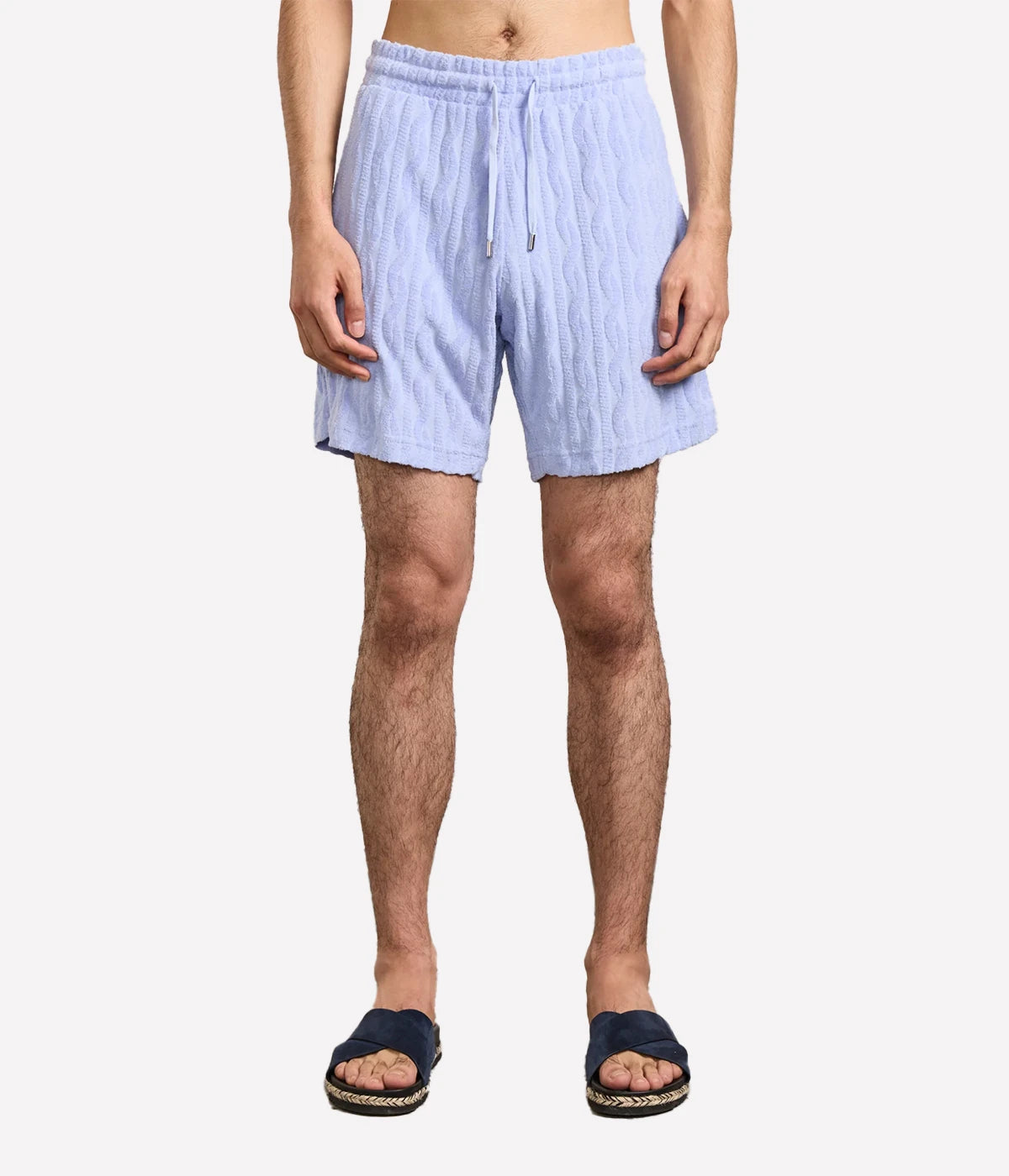 Light blue Augusto shorts by Frescobol, crafted from 100% cotton with a relaxed fit. Features an elasticated adjustable waist, zip-fly, branded metal-cord ends, side slip pockets, and a back pocket with button closure.