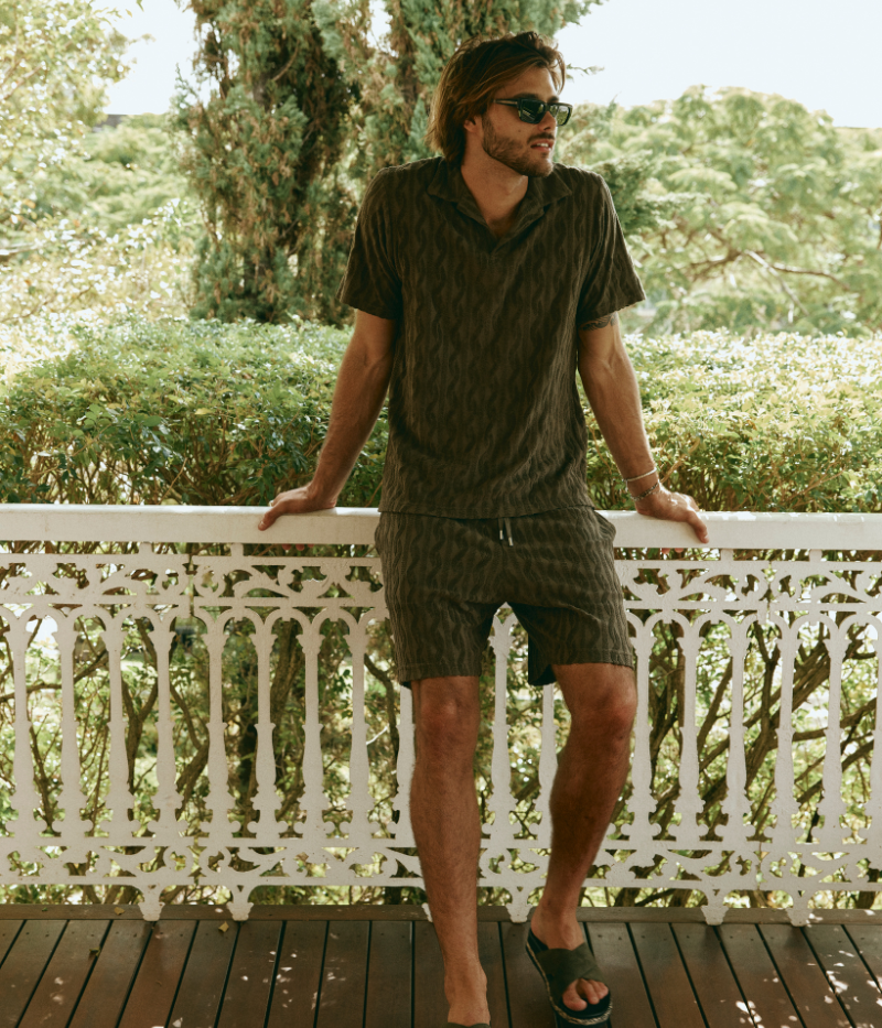 Men's Augusto Shorts by Frescobol Carioca in lightweight cotton with a relaxed fit, elasticated waist, zip-fly, side pockets, and back buttoned pocket.