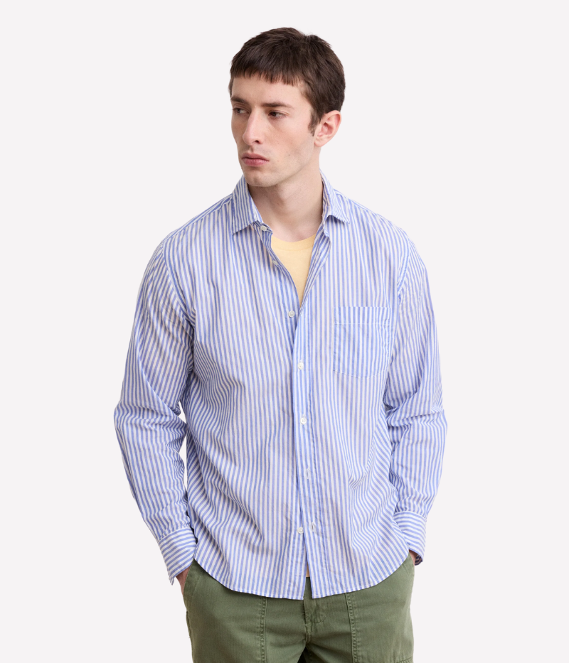 Men’s blue and white striped button-up shirt by Hartford, made from 100% cotton with a relaxed fit and classic collar. Perfect for smart-casual styling.