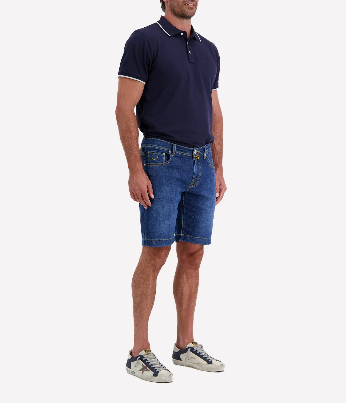 Jacob Cohen Nicolas Bermuda Shorts in blue denim with a slim fit and low waist, featuring a classic 5-pocket design. Made from a breathable cotton-linen blend with stretch for comfort. Made in Italy.