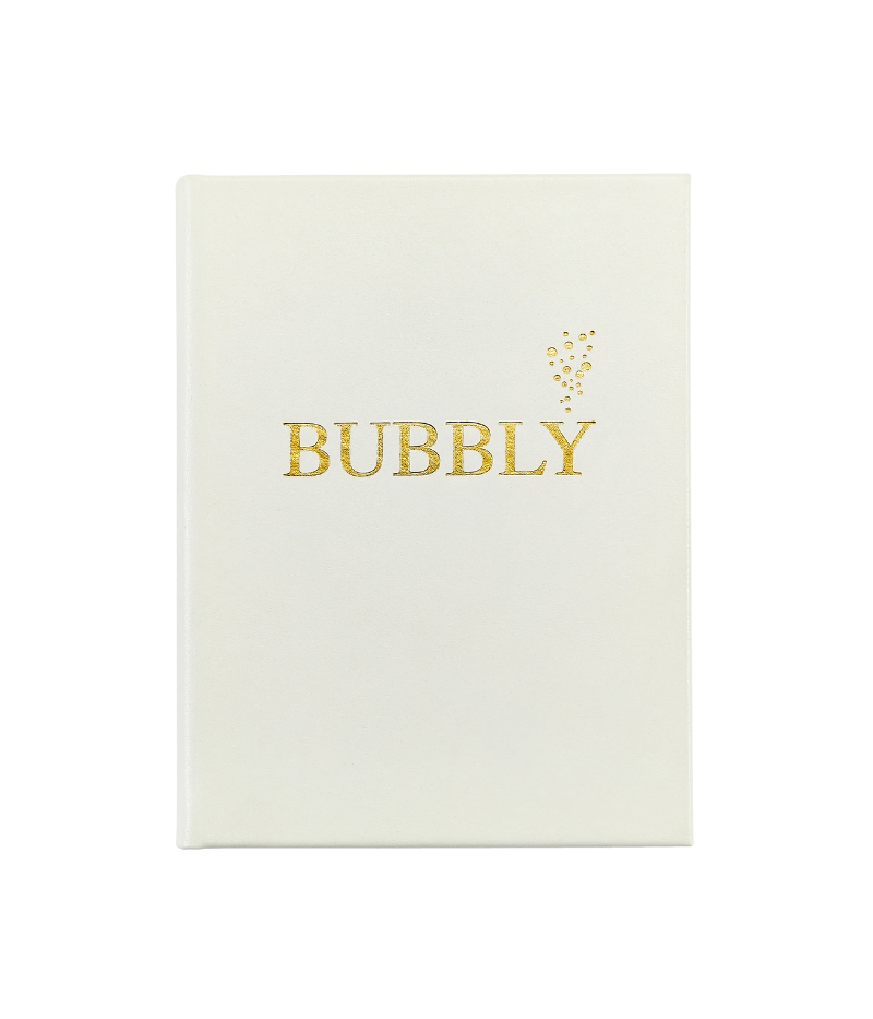 Luxury cocktail recipe book, gold foil hardcover with rounded corners, featuring 176 pages of champagne-based recipes, tips, and vibrant photography.