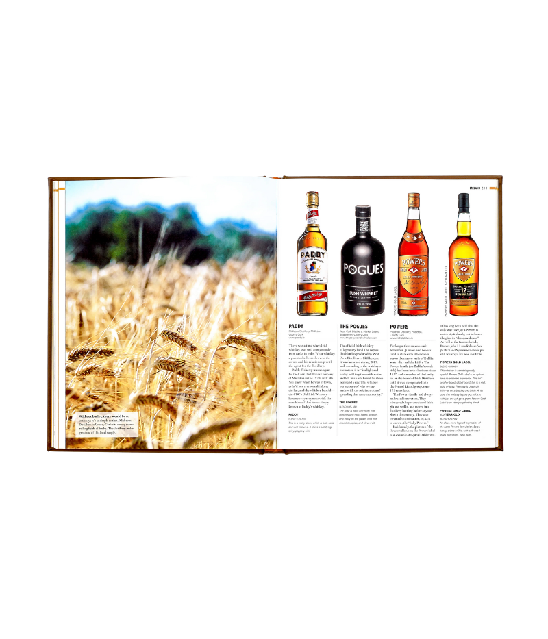 Luxury whiskey guide, hand-bound in bonded leather, featuring 352 pages on 700+ whiskey varieties, award-winners, and global distilleries.