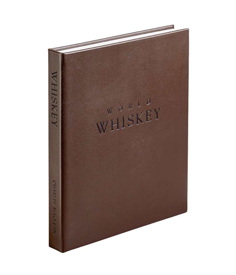 Luxury whiskey guide, hand-bound in bonded leather, featuring 352 pages on 700+ whiskey varieties, award-winners, and global distilleries.