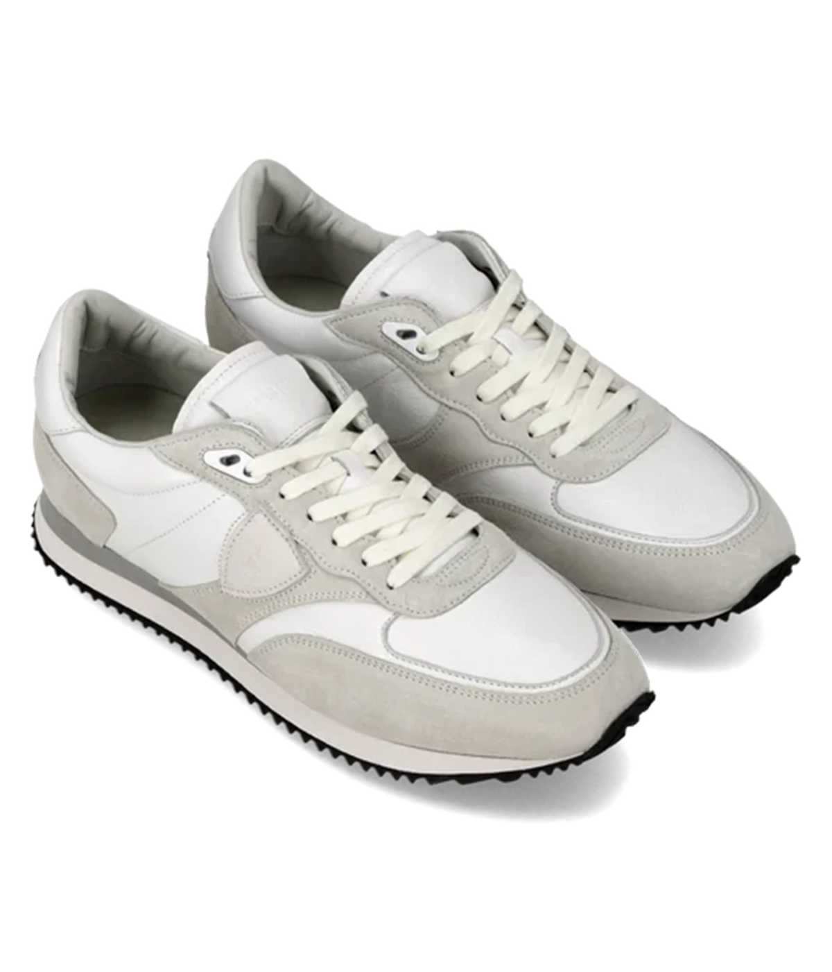Angled view of a pair of Philippe Model Blville Low Man in Veau Daim Blanc