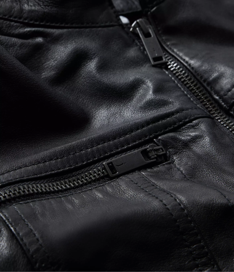 John Varvatos sheepskin leather jacket with a denim silhouette, featuring zipped chest pockets, dual zip front closure, and a fully lined interior.