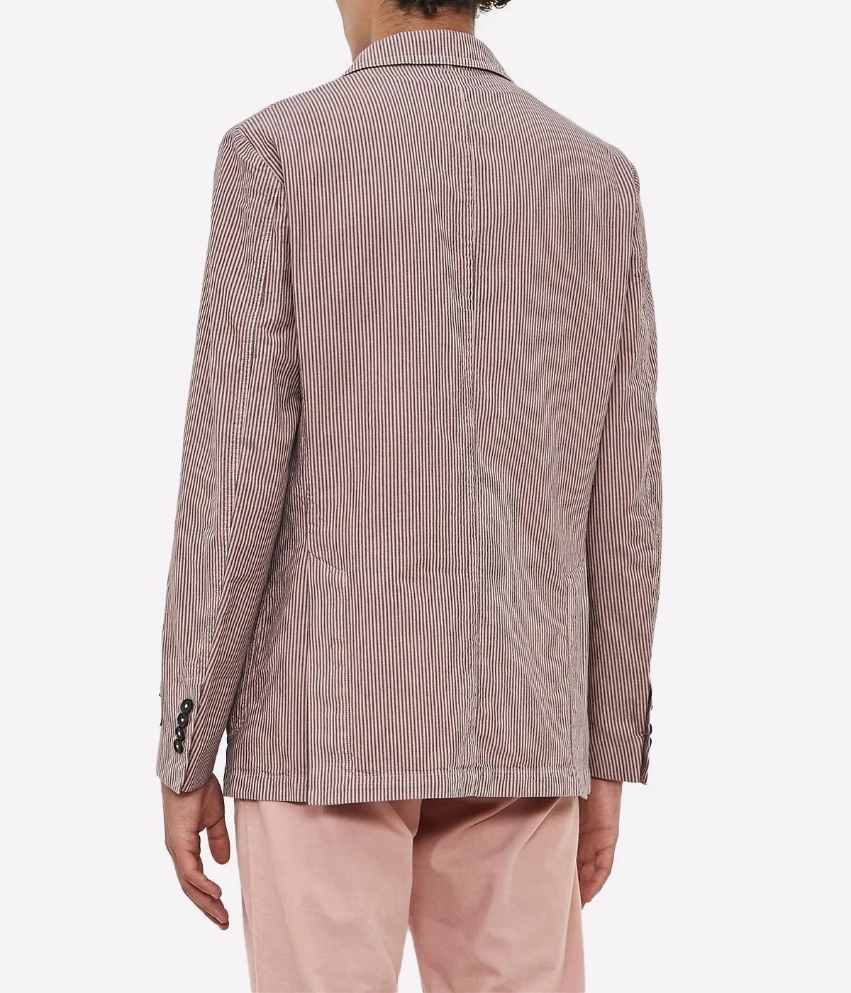 Deconstructed cotton-linen jacket with a two-button front, patch pockets, and dark horn buttons.