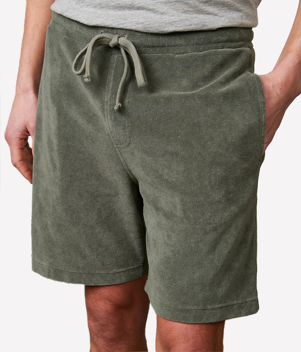 Military green Bouclette Bermuda shorts made from soft cotton terry towelling, featuring a drawstring waist and side pockets for casual comfort