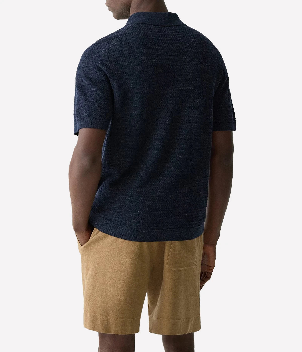 Men's open-collar polo shirt in a breathable cotton-linen blend, featuring a standard fit and short sleeves, ideal for smart-casual summer outfits.