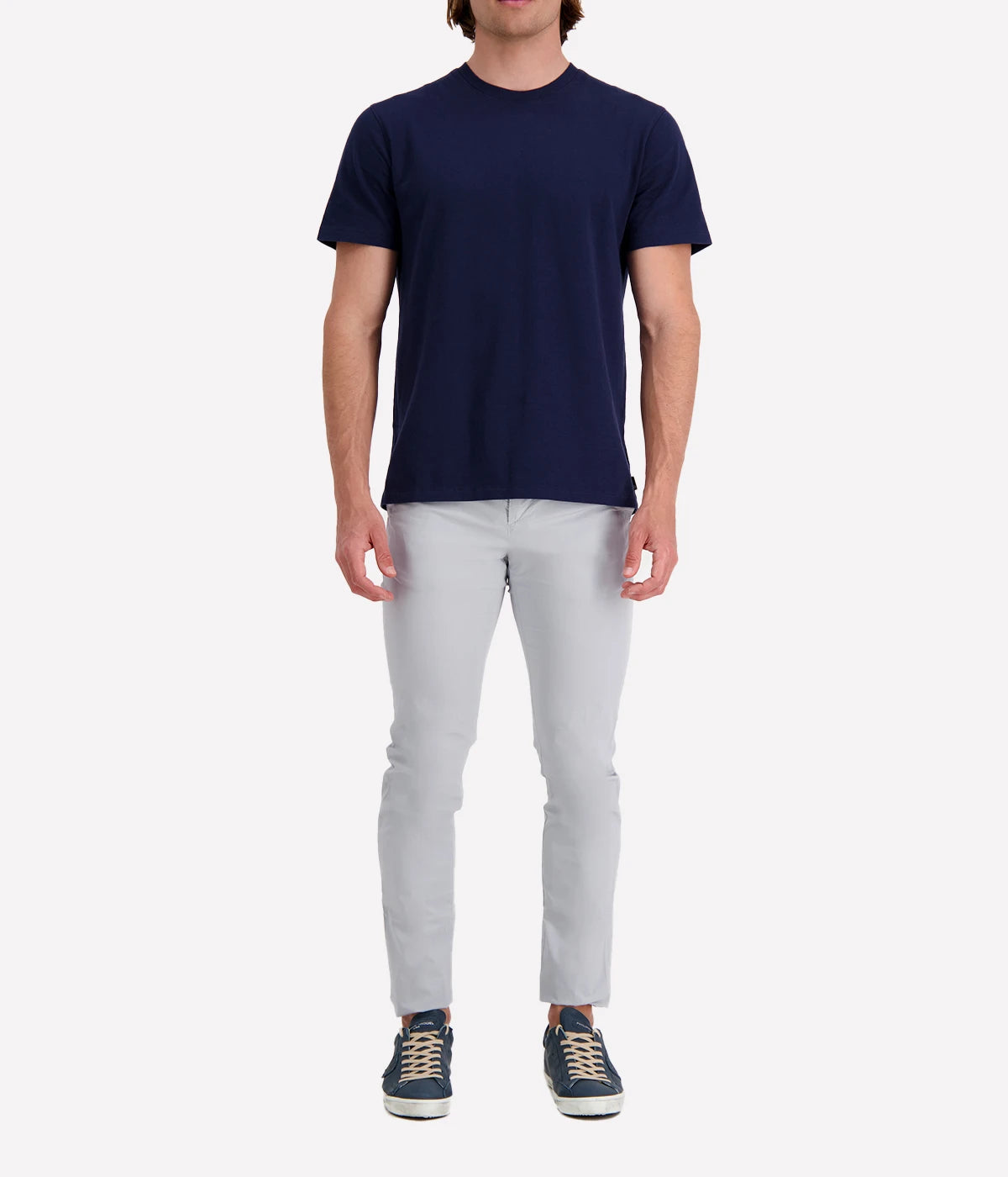 The AG Bryce Crew Neck T-Shirt styled casually with trousers, demonstrating its versatility as a wardrobe essential.