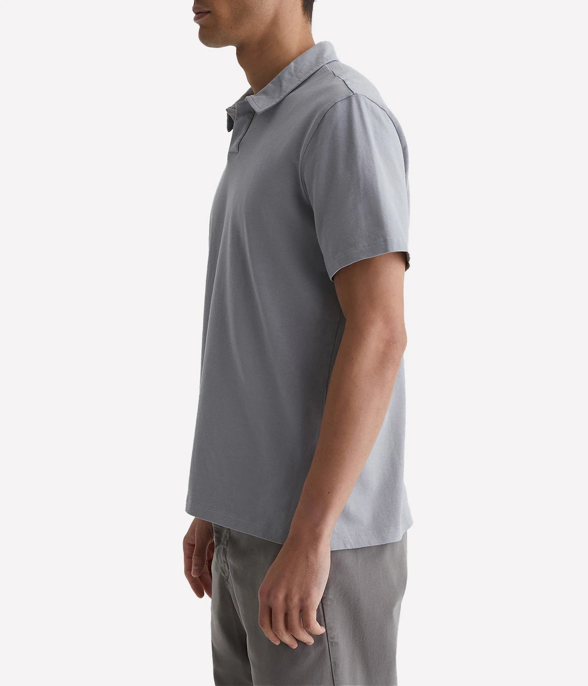 Side profile of the Bryce Johnny Collar polo shirt, showcasing the relaxed fit and smooth finish of the lightweight cotton jersey.